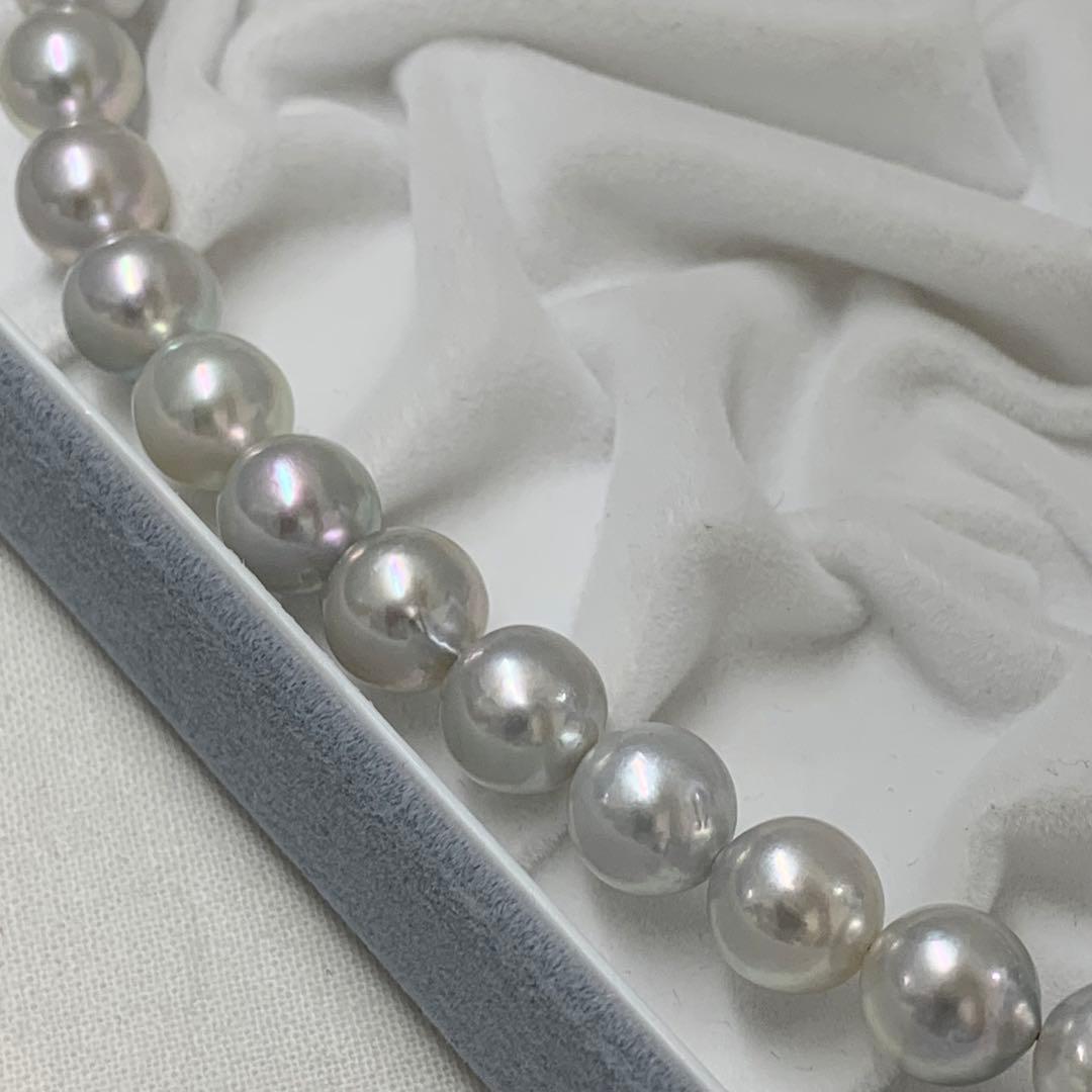 Natural gray Akoya pearl necklace 9-9.5mm with silver clasp on white background