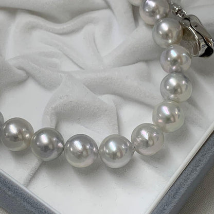 Natural gray Akoya pearl necklace 9-9.5mm with silver clasp on white background