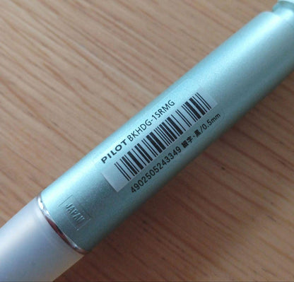 Pilot Dr. Grip 1+1 multi-function pen with metallic light blue barrel and 0.5mm black ballpoint tip