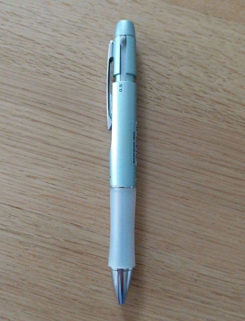 Pilot Dr. Grip 1+1 multi-function pen with metallic light blue barrel and 0.5mm black ballpoint tip