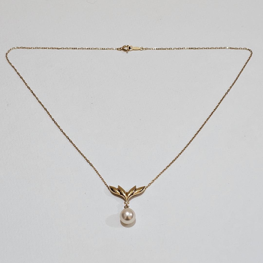 Mikimoto pearl diamond necklace in 18K yellow gold with 40cm chain featuring a 7.6mm pearl and diamond accents