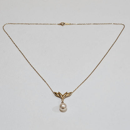Mikimoto pearl diamond necklace in 18K yellow gold with 40cm chain featuring a 7.6mm pearl and diamond accents