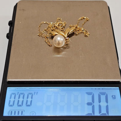 Mikimoto pearl diamond necklace in 18K yellow gold with 40cm chain featuring a 7.6mm pearl and diamond accents