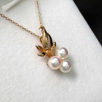 TASAKI Akoya Pearl Pendant Top featuring three 5.1-5.4mm pearls set in 14K gold weighing 1.75g