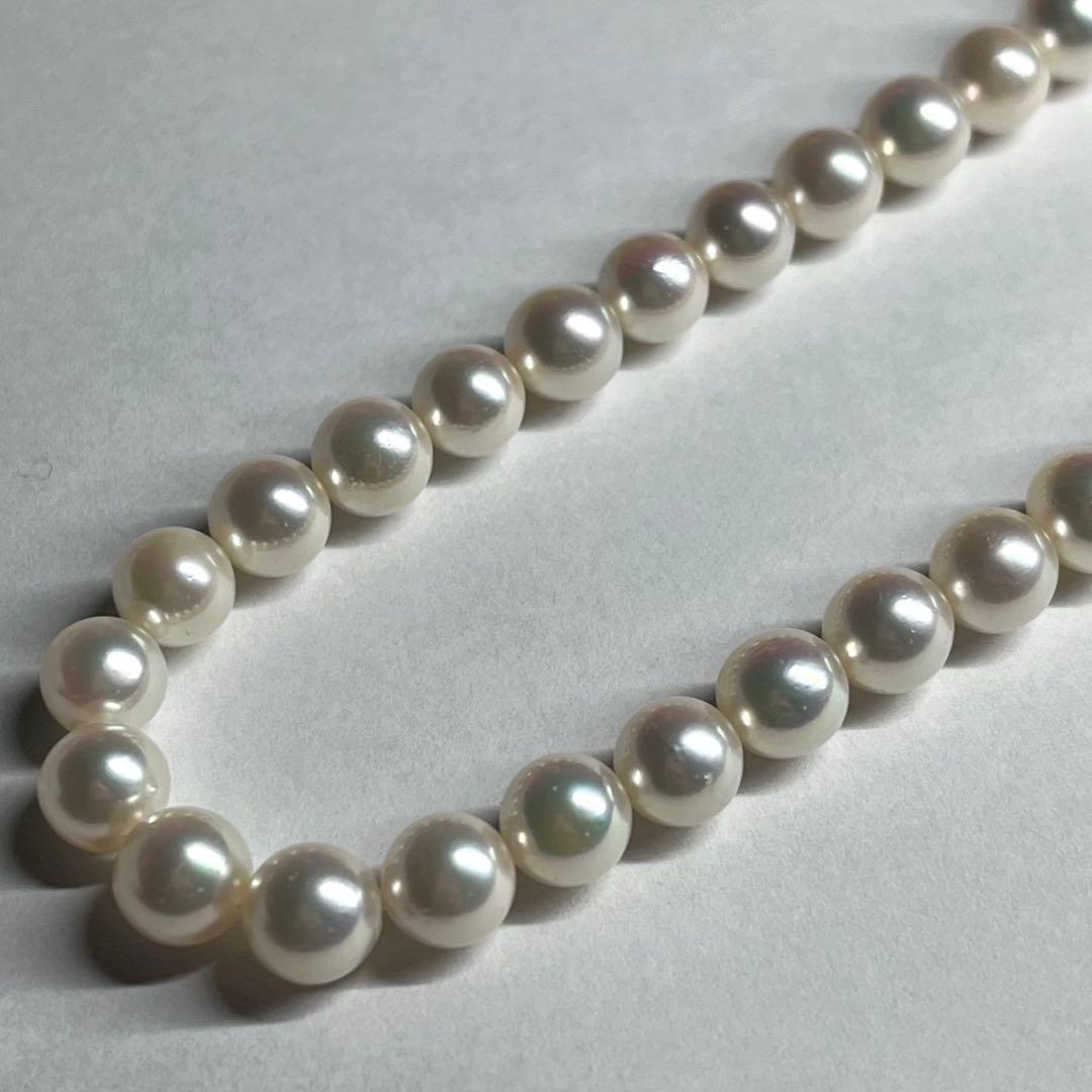 Aurora Interference Color Akoya pearl necklace featuring 6.5-7.0mm pearls and a silver clasp