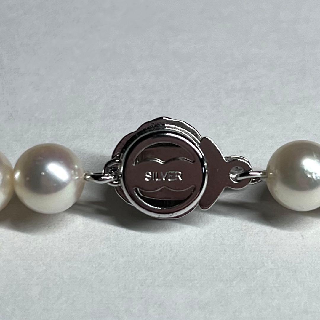 Aurora Interference Color Akoya pearl necklace featuring 6.5-7.0mm pearls and a silver clasp