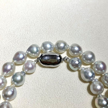 Akoya pearl necklace with blue gray round pearls sized 8.5-9.0mm on a 43 cm string