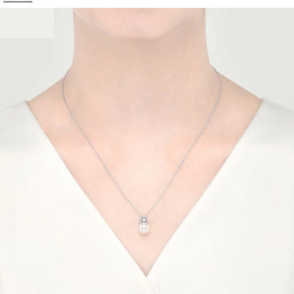 Mikimoto Akoya pearl necklace with 8.25 mm pearls and diamond accents in 18K white gold, 50 cm chain length