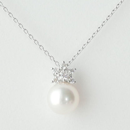 Mikimoto Akoya pearl necklace with 8.25 mm pearls and diamond accents in 18K white gold, 50 cm chain length