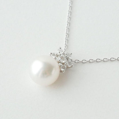 Mikimoto Akoya pearl necklace with 8.25 mm pearls and diamond accents in 18K white gold, 50 cm chain length