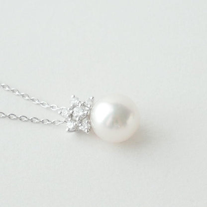 Mikimoto Akoya pearl necklace with 8.25 mm pearls and diamond accents in 18K white gold, 50 cm chain length