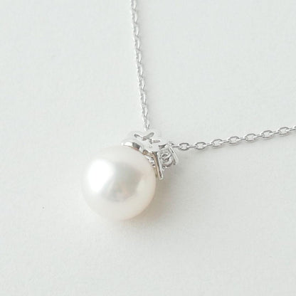 Mikimoto Akoya pearl necklace with 8.25 mm pearls and diamond accents in 18K white gold, 50 cm chain length