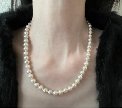 Genuine Akoya pearl necklace with 7.8mm semi-round pearls and matching 7mm pearl earrings in white color