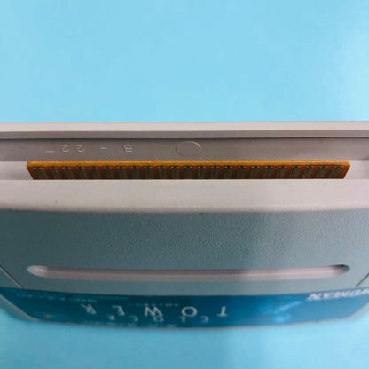 Super Famicom Clock Tower game cartridge with visible scratches and marks