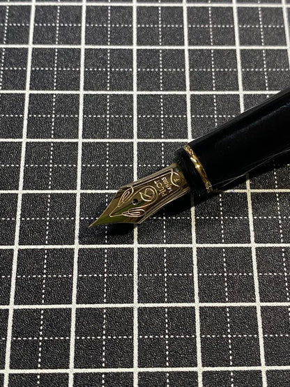 PILOT Grance fountain pen in pearl pink with fine 0.7mm 14K gold nib shown with cap off