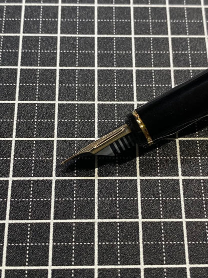 PILOT Grance fountain pen in pearl pink with fine 0.7mm 14K gold nib shown with cap off