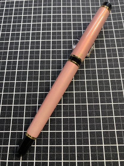 PILOT Grance fountain pen in pearl pink with fine 0.7mm 14K gold nib shown with cap off