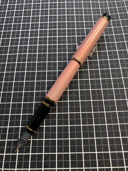 PILOT Grance fountain pen in pearl pink with fine 0.7mm 14K gold nib shown with cap off