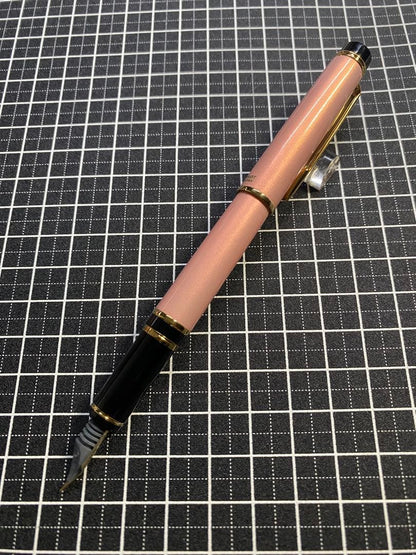 PILOT Grance fountain pen in pearl pink with fine 0.7mm 14K gold nib shown with cap off