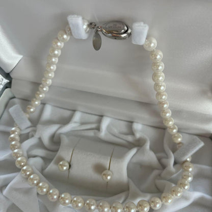 Akoya Pearl 3-piece set with necklace featuring single-pearl pendant and titanium earrings displayed in a gray case