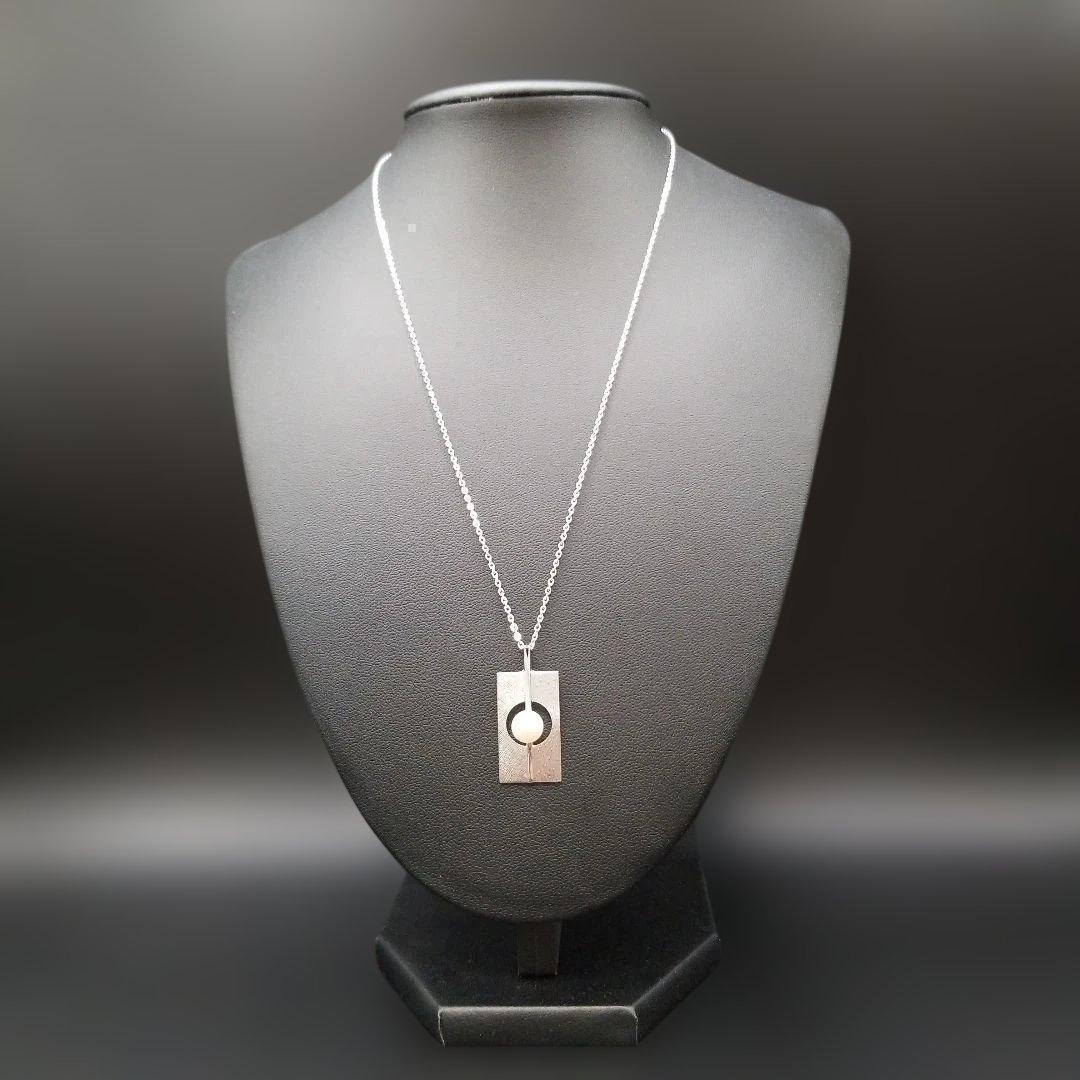 Mikimoto silver plate pearl ladies necklace with 6mm pearl and silver chain showing MS charm on pendant back
