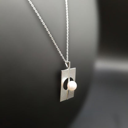 Mikimoto silver plate pearl ladies necklace with 6mm pearl and silver chain showing MS charm on pendant back