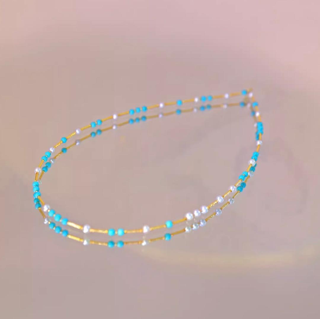 K18YG necklace featuring 3-4mm Akoya pearls and turquoise wire station on a 40cm chain