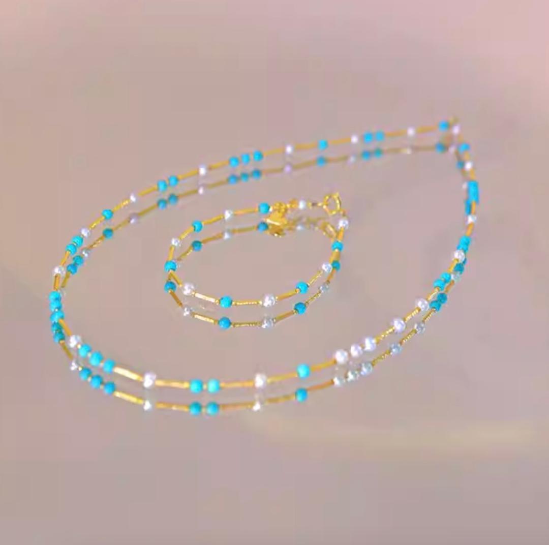 K18YG necklace featuring 3-4mm Akoya pearls and turquoise wire station on a 40cm chain