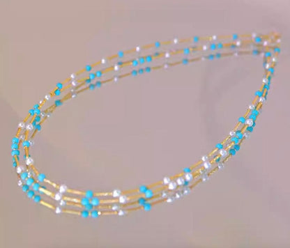 K18YG necklace featuring 3-4mm Akoya pearls and turquoise wire station on a 40cm chain