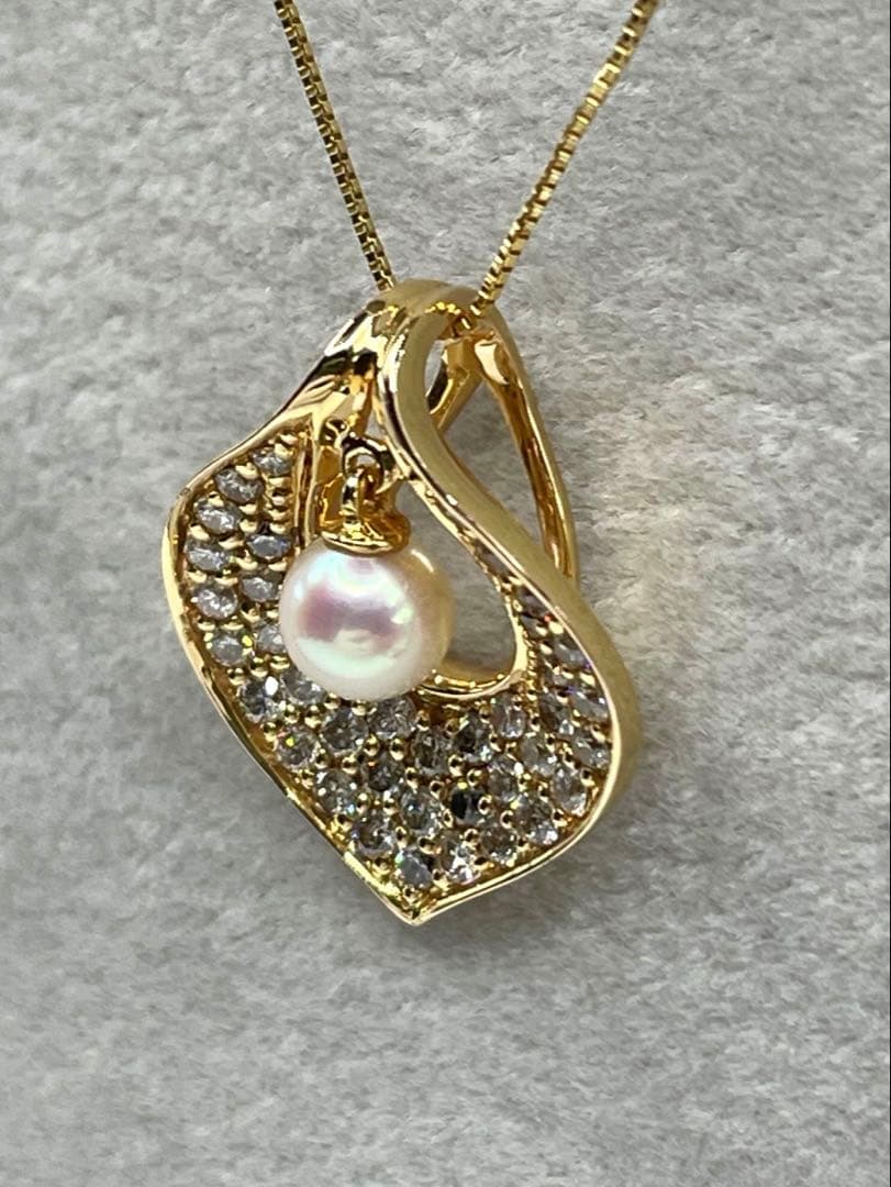 Law Akoya Pearl Diamond K18 pendant top with 5.10mm pearl and 0.65ct diamond on white background