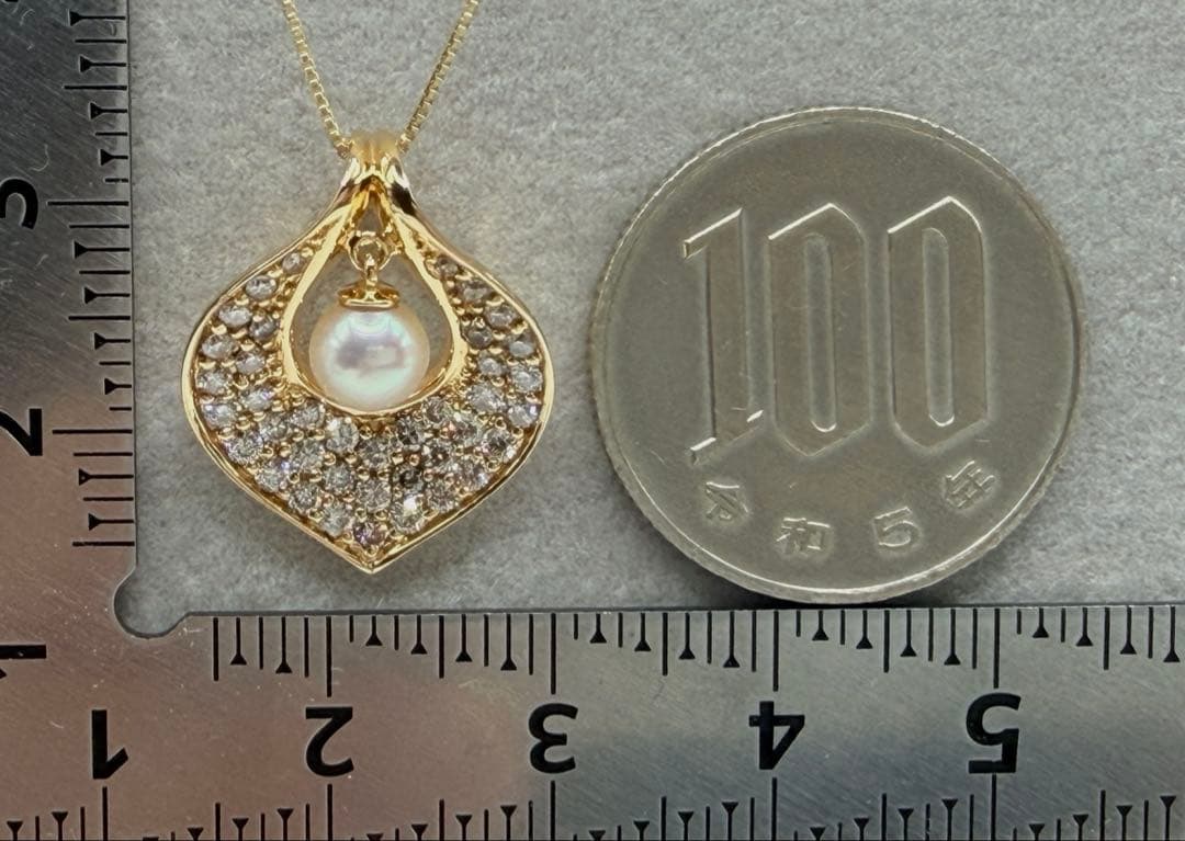 Law Akoya Pearl Diamond K18 pendant top with 5.10mm pearl and 0.65ct diamond on white background
