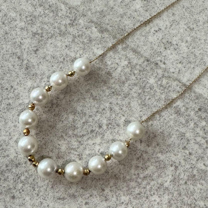 Honjin Akoya pearl necklace featuring 8.42mm white pearls on a 70cm K18 gold chain