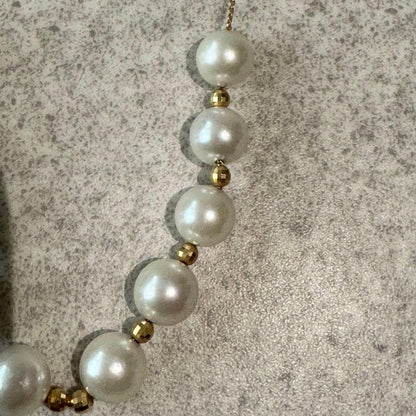 Honjin Akoya pearl necklace featuring 8.42mm white pearls on a 70cm K18 gold chain