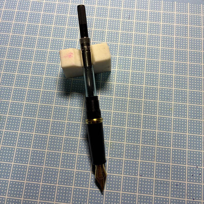Waterman Fountain Pen with stainless steel fine tip shown with cap off on white background