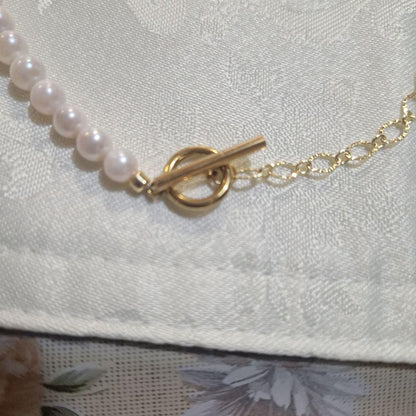 Akoya pearl pendant necklace with a 6mm pearl on a 48cm 14kgf chain displayed on a white background