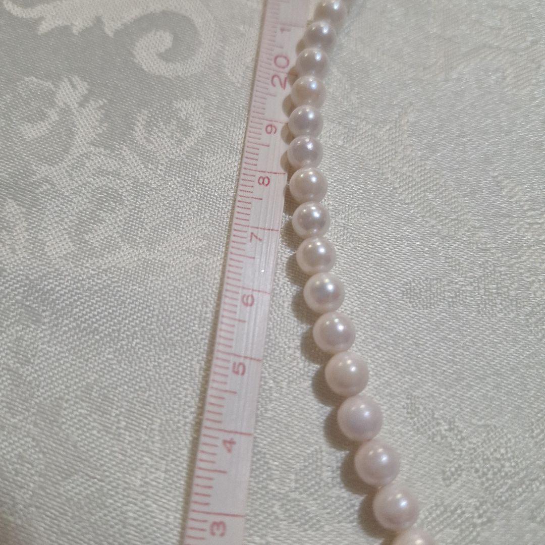 Akoya pearl pendant necklace with a 6mm pearl on a 48cm 14kgf chain displayed on a white background