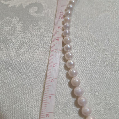 Akoya pearl pendant necklace with a 6mm pearl on a 48cm 14kgf chain displayed on a white background