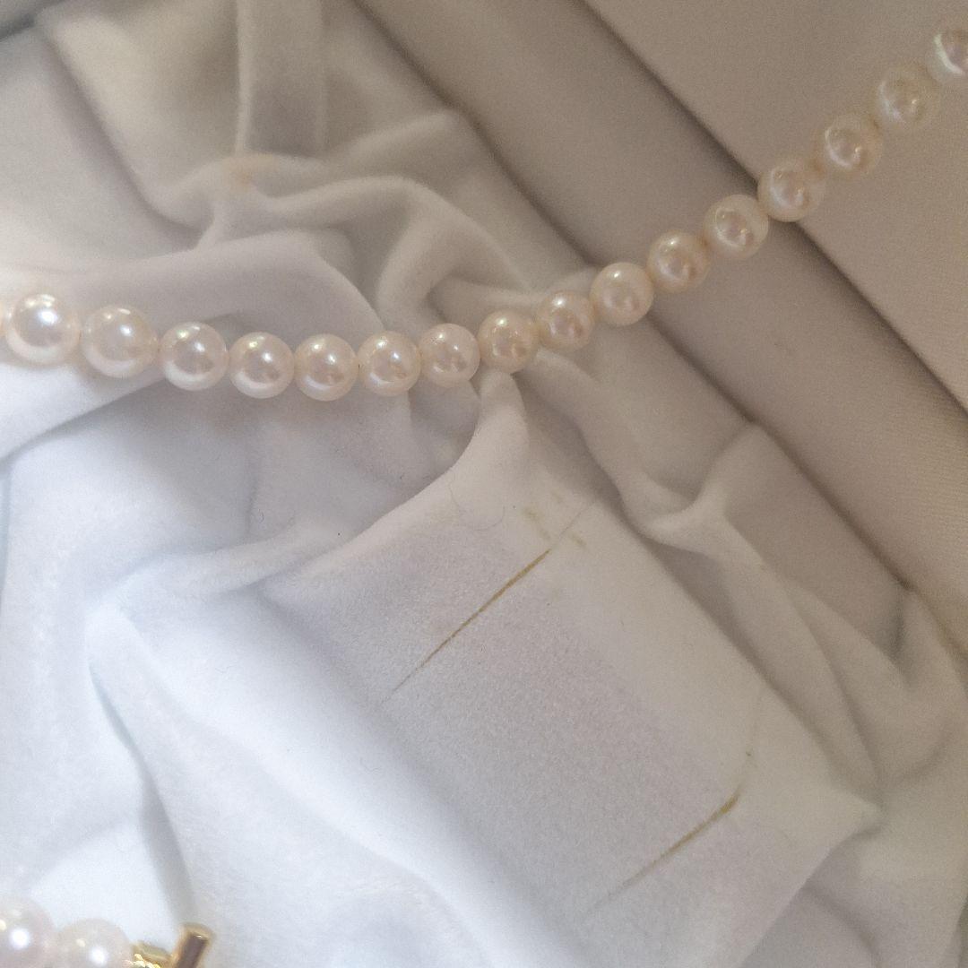 Akoya pearl pendant necklace with a 6mm pearl on a 48cm 14kgf chain displayed on a white background