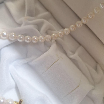 Akoya pearl pendant necklace with a 6mm pearl on a 48cm 14kgf chain displayed on a white background