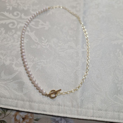 Akoya pearl pendant necklace with a 6mm pearl on a 48cm 14kgf chain displayed on a white background