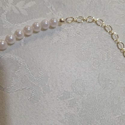 Akoya pearl pendant necklace with a 6mm pearl on a 48cm 14kgf chain displayed on a white background