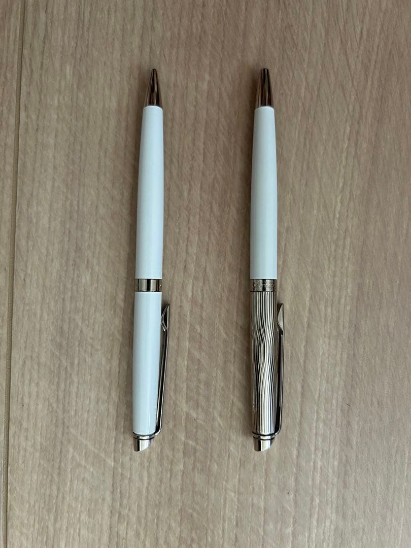 Waterman pen and mechanical pencil set with white bodies and wave-engraved cap