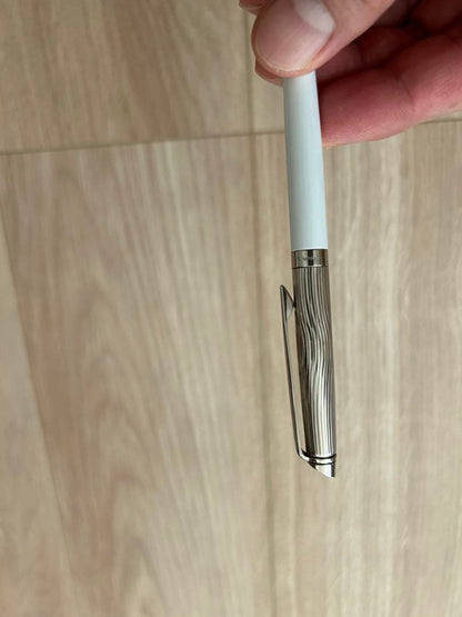 Waterman pen and mechanical pencil set with white bodies and wave-engraved cap