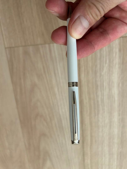 Waterman pen and mechanical pencil set with white bodies and wave-engraved cap