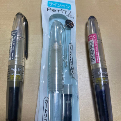 Pilot Petitte pen set with black fountain pen, black sign pen, and blue-black brush pen displayed