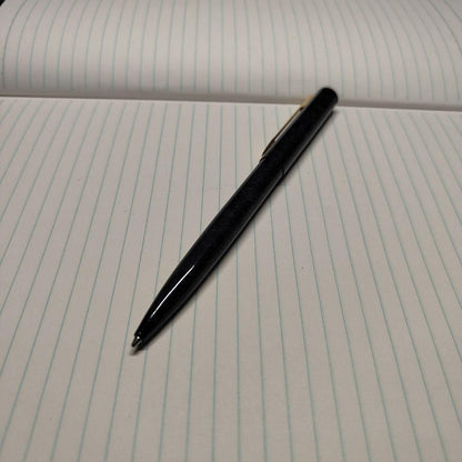 Waterman black ballpoint pen with gold clip and slim black plastic body