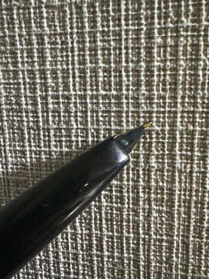 Vintage PILOT short black plastic fountain pen with 14K gold nib, breast pocket size, used condition