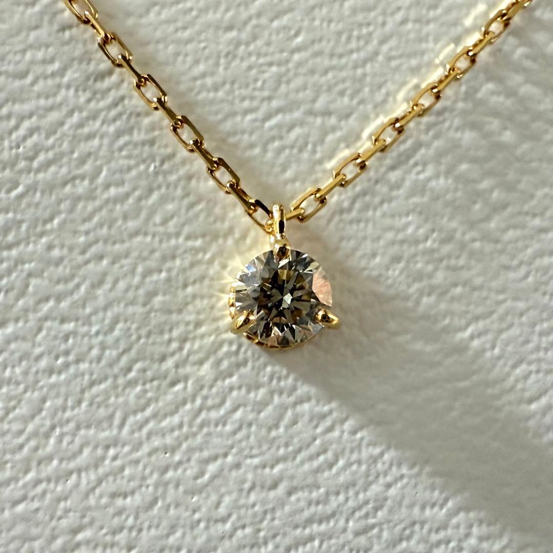 Agete Law K18 yellow gold necklace with 0.08 ct diamond and 40 cm chain displayed on white background