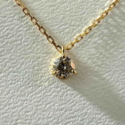 Agete Law K18 yellow gold necklace with 0.08 ct diamond and 40 cm chain displayed on white background