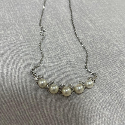 Mikimoto silver necklace with 5.7-6.0mm round pearls weighing 4.5 grams